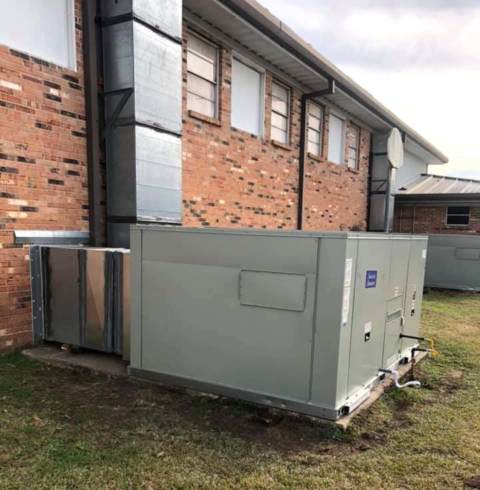 Installation of a 15 ton commercial HVAC unit