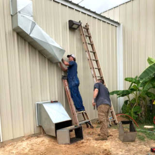 Installing the ductwork for an American Standard HVAC